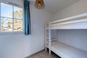 Postel nebo postele na pokoji v ubytování La Cabre d'Or - Duplex avec piscine partagée