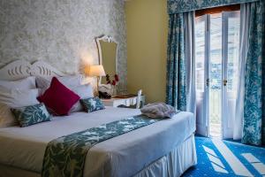 Uma cama ou camas num quarto em The Vintage House - Douro