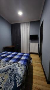 Postel nebo postele na pokoji v ubytování Velio Guest House
