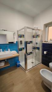 a bathroom with a shower and a sink at B&B IMMARE in Brindisi +9 photos