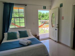 Postel nebo postele na pokoji v ubytování Shell Sea B & B
