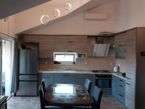 Kuchyň nebo kuchyňský kout v ubytování Mislav Apartment