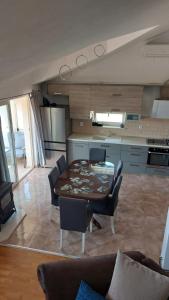 Kuchyň nebo kuchyňský kout v ubytování Mislav Apartment