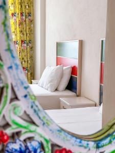 Ein Bett oder Betten in einem Zimmer der Unterkunft Abelia Otel