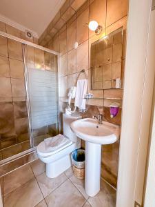 Ein Badezimmer in der Unterkunft Abelia Otel