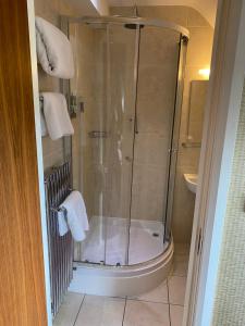 a shower with a glass door in a bathroom at 315 Bar & Restaurant in Huddersfield +24 photos
