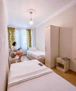 Ein Bett oder Betten in einem Zimmer der Unterkunft Abelia Otel