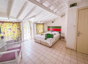 Ein Bett oder Betten in einem Zimmer der Unterkunft Abelia Otel