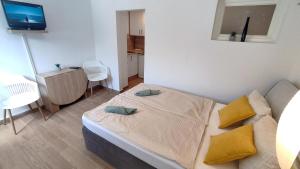 Letto o letti in una camera di Comfy Studio in Ankaran JB4