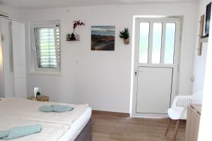 Letto o letti in una camera di Comfy Studio in Ankaran JB4