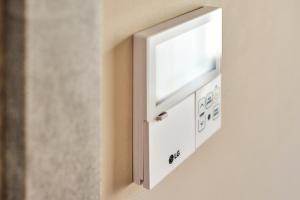 a lightswitch on a wall with a white socket at Aparthotel Rimska 14 in Prague