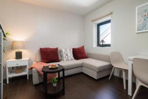 Area soggiorno di Host Wise - Impressive Restful Houses