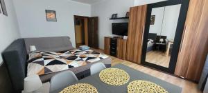 Posteľ alebo postele v izbe v ubytovaní Apartament Skwer Kosciuszki Morze