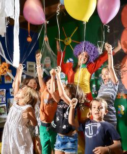 a group of children holding balloons in a party at Vasia Resort & Spa in Sisi +37 photos