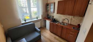Kuchyňa alebo kuchynka v ubytovaní Apartament Skwer Kosciuszki Morze