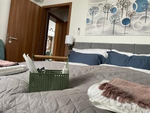 Postel nebo postele na pokoji v ubytování Jázmin Apartman