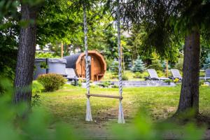 Vonkajšia záhrada v ubytovaní Srebrny Bucznik Wellness & Restaurant