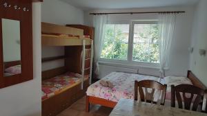 Posteľ alebo postele v izbe v ubytovaní Ubytování Carmen