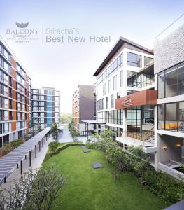 a rendering of the best new hotel in a city at Balcony Courtyard Sriracha Hotel & Serviced Apartments in Si Racha