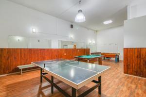 a room with two ping pong tables in it at Oceana Suites BoraBora in Punta del Este +29 photos