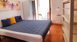 Katil atau katil-katil dalam bilik di Casa di Mafi