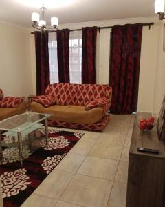 Seating area sa Lux Suites Neema Court Furnished Apartments