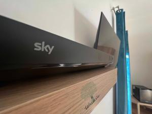 TV a/nebo společenská místnost v ubytování Ulivi di Cleo