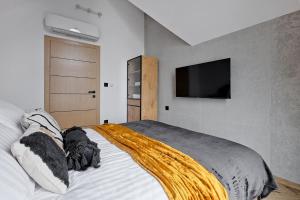 Postel nebo postele na pokoji v ubytování Domek Panorama z Jacuzzi