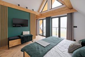 Postel nebo postele na pokoji v ubytování Domek Panorama z Jacuzzi