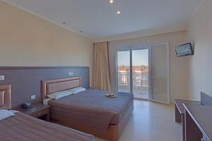 Postel nebo postele na pokoji v ubytování Grand Platon Hotel + 37 fotografií