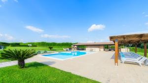 The swimming pool at or close to PODERE TORRICELLA 16, Emma Villas