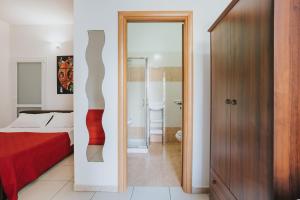 Postel nebo postele na pokoji v ubytování B&B Nuovo Reale - CENTRO STORICO
