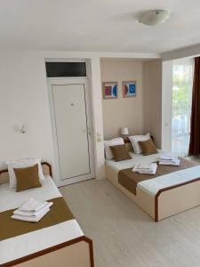 Postel nebo postele na pokoji v ubytování Къща за гости CANAVAN'S