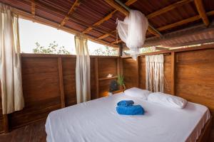 Postel nebo postele na pokoji v ubytování Skycamp Camping Holbox