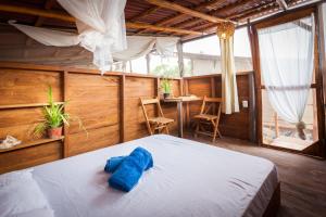 Postel nebo postele na pokoji v ubytování Skycamp Camping Holbox
