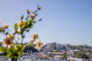 a view of a city with buildings in the background at Fully equipped apartment in Rockdale in Sydney