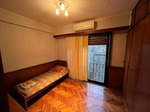 Tempat tidur dalam kamar di Depto clásico en Vicente lopez