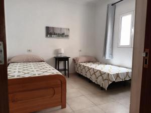 Posteľ alebo postele v izbe v ubytovaní Al Charco
