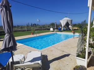 Bazén v ubytovaní Villa Ela Ferienappartements alebo v jeho blízkosti