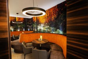 Ein Sitzbereich in der Unterkunft Thermalhotel Kemper