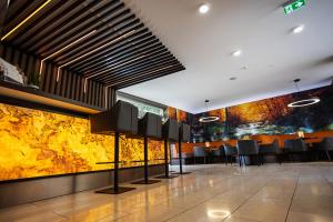 Ein Restaurant oder anderes Speiselokal in der Unterkunft Thermalhotel Kemper 