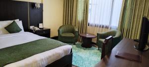 Voodi või voodid majutusasutuse Hotel Vaishali toas