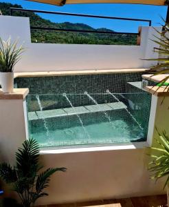 Bazén v ubytování La Casa Junto al Sendero del Río & Piscina # aire acondicionado nebo v jeho okolí
