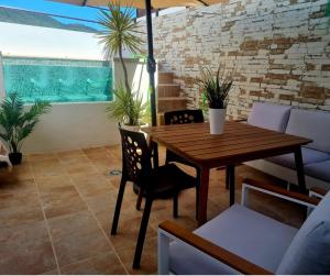 Balkón nebo terasa v ubytování La Casa Junto al Sendero del Río & Piscina # aire acondicionado