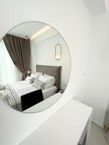 Postel nebo postele na pokoji v ubytování Oceana Suites