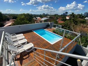 Bazén v ubytování Apart-Hotel de Lujo en Eje Corporativo de Asunción! 2 y 3 habitaciones nebo v jeho okolí