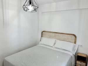 Posteľ alebo postele v izbe v ubytovaní PEÑISCOLA Playa LES DOYES