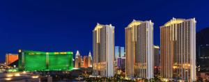 a group of tall buildings in a city at night at MGM Signature PH 30th floor Deluxe Studio apartment Strip Facing with Balcony in Las Vegas