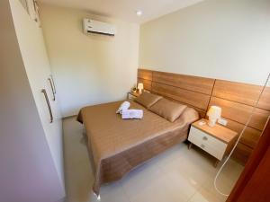 Postel nebo postele na pokoji v ubytování Apart-Hotel de Lujo en Eje Corporativo de Asunción! 2 y 3 habitaciones