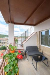 En balkon eller terrasse på Sunset Luxury Apartment